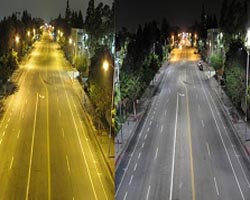 Photo comparing High Pressure Sodium lighting next to LED street lighting