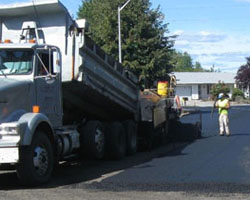 Asphalt pour during annual pavement overlay maintenance