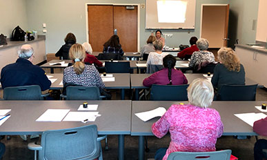 The multi-purpose room features a classroom-like setup