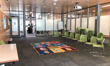 The Shute Park meeting room features tables, chairs, and can seat 57.