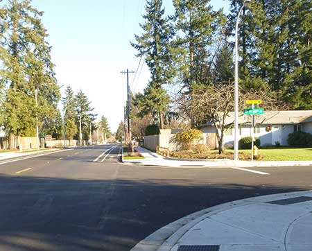 Intersection of Southeast Cedar Street and 40th Court after improvements. Sidewalks and accessible tactile paving features have been added