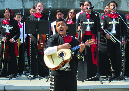 Uno Voz performing at outdoor festival