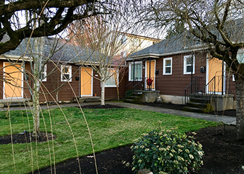 A one-story quadplex with shared courtyard