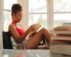 A woman relaxes and reads