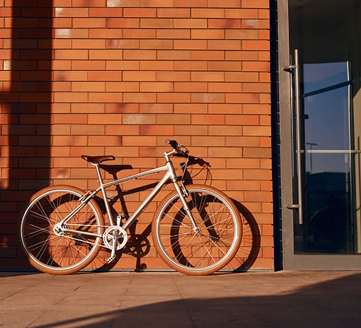 A bike parked in front of a bicycle commuting facility