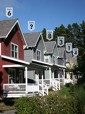 A series of homes with their Home Energy Scores above them