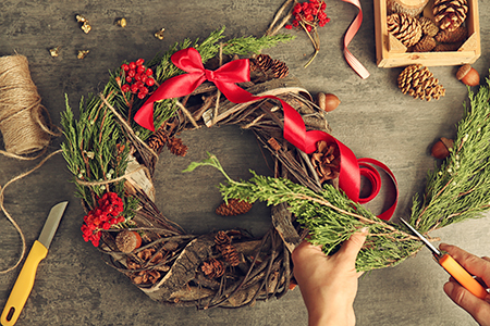 Photo of woman making a wreath.