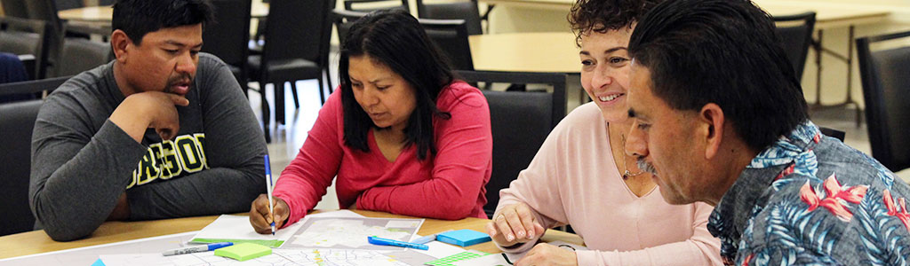 A group of community members meets to discuss Land Use