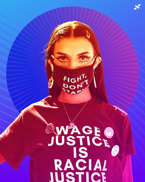 Haley Carrera posing while wearing a mask and shirt that says "wage justice is racial justice"