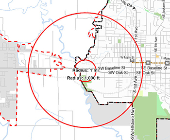 A map illustrating a 1000 foot radius and 1 mile radius around the purchased location for Hillsboro's future year-round shelter