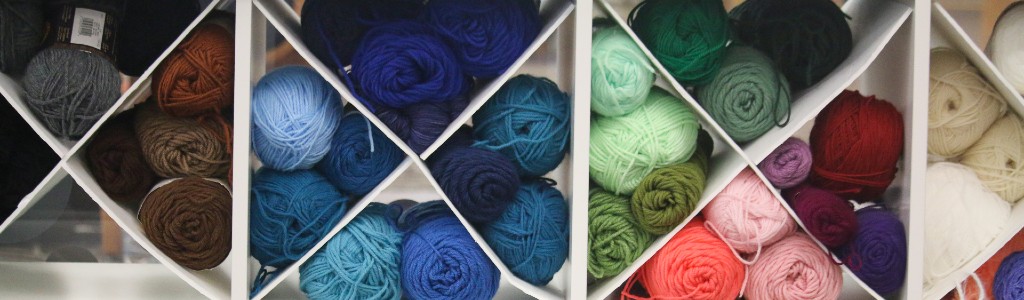 different color spools of yarn