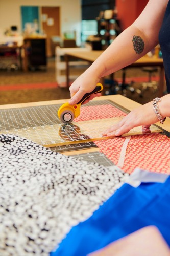 Cutting fabric with a rotary cutter