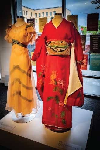 A red and a yellow traditional Japanese outfits on display