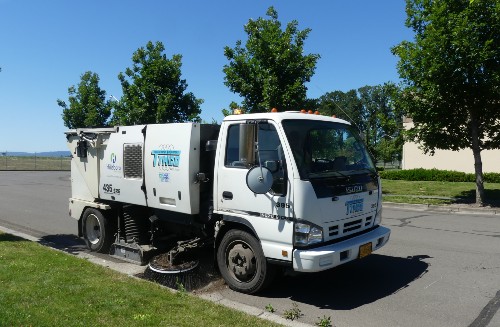 Street Sweeping truck on roadway