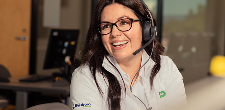 HiLight customer service representative smiling with headset on