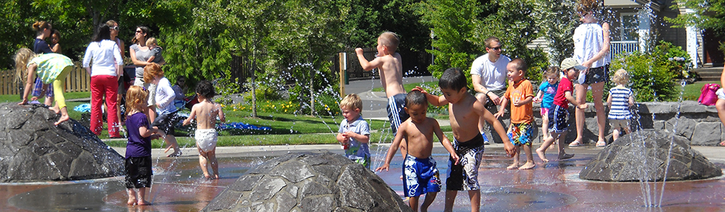 Children play at the Magnolia Park sprayground