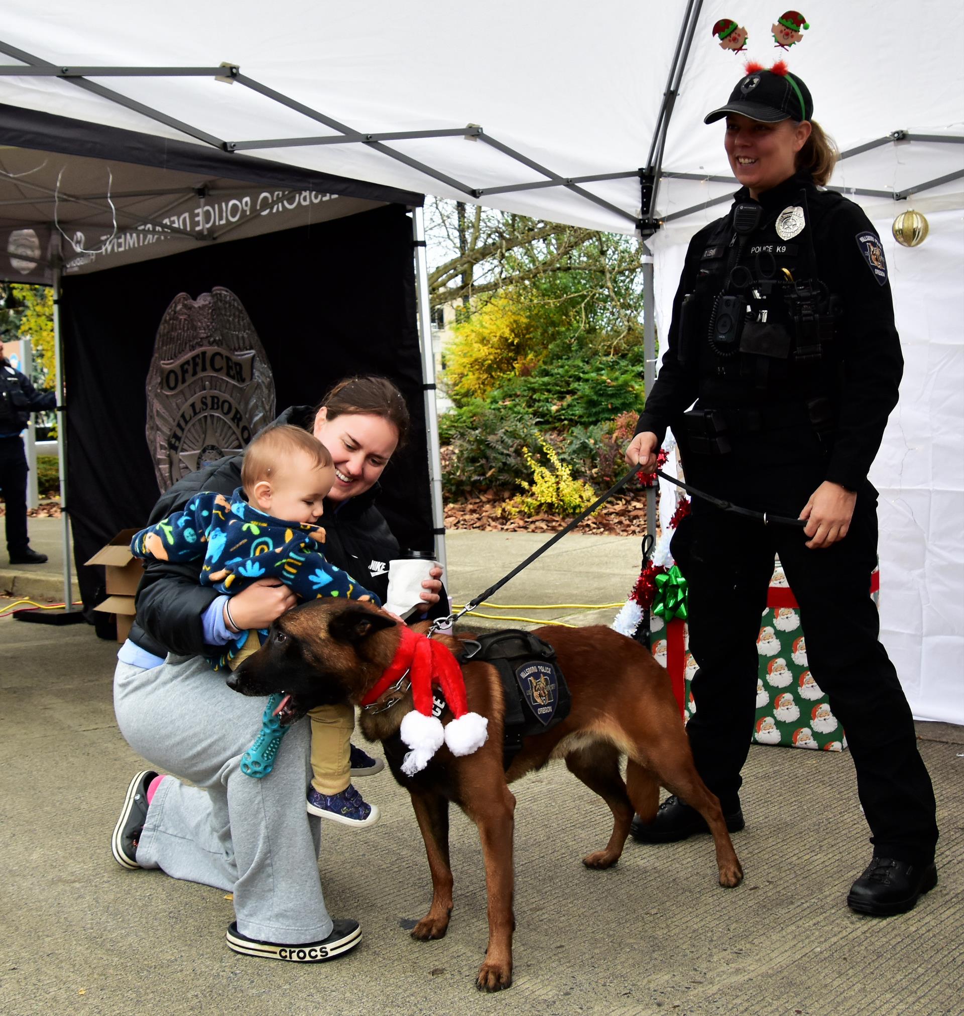 Ofc. Leman and Dozer at Holly Days