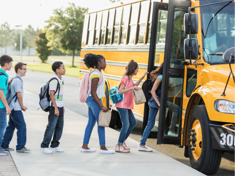 Kids boarding a school bus